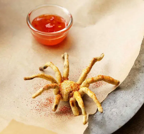 23923 people eating fried tarantula